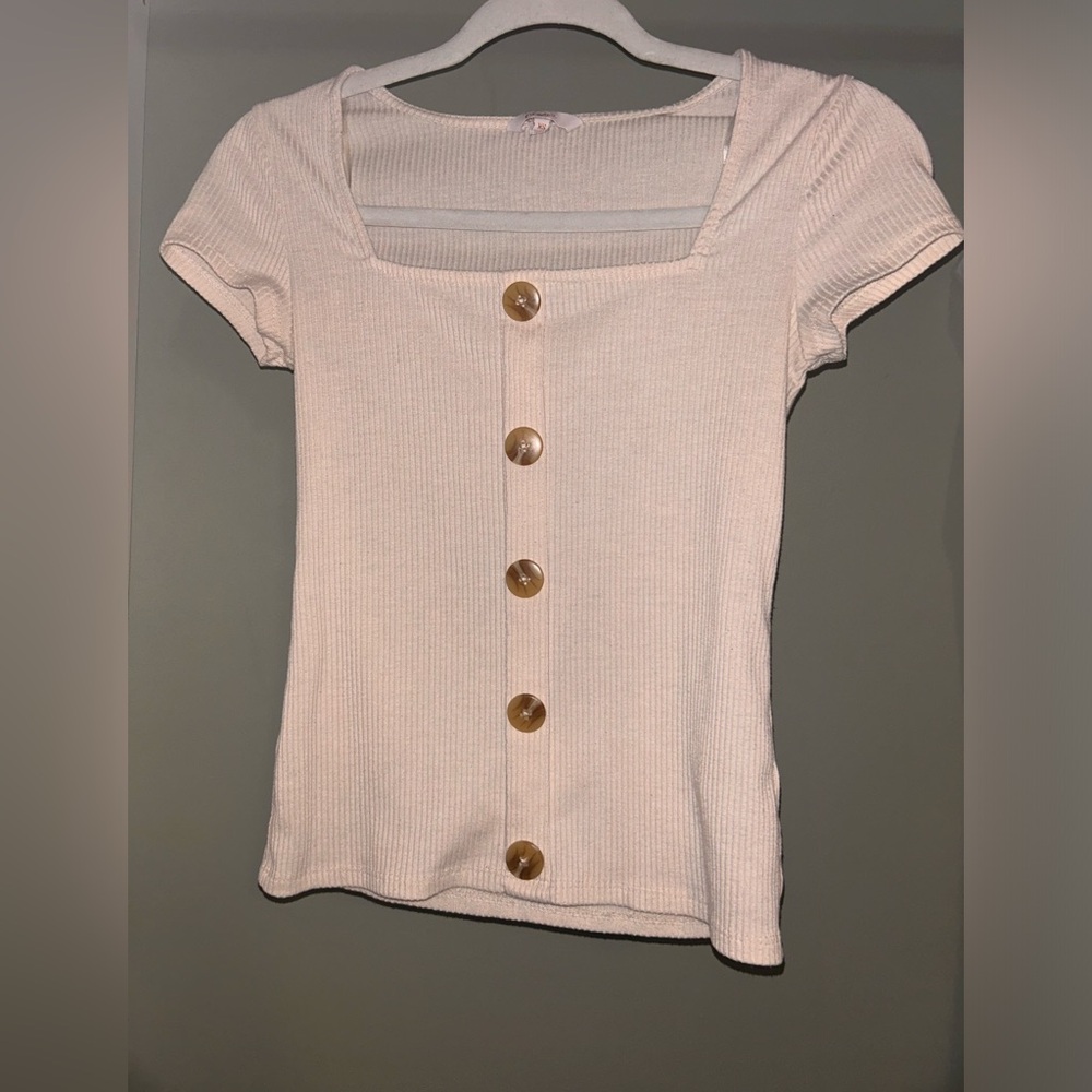 Brand is Candie’s and size is a small/extra small and color is cream